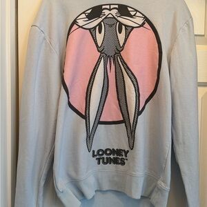 Warner Bros. Looney Tunes Tag on Light Blue Fabric